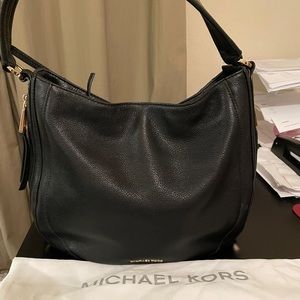 Michael Kors black leather shoulder bag.
